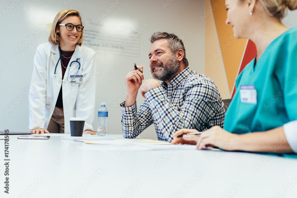 Medical team interacting at a meeting in boardroom
